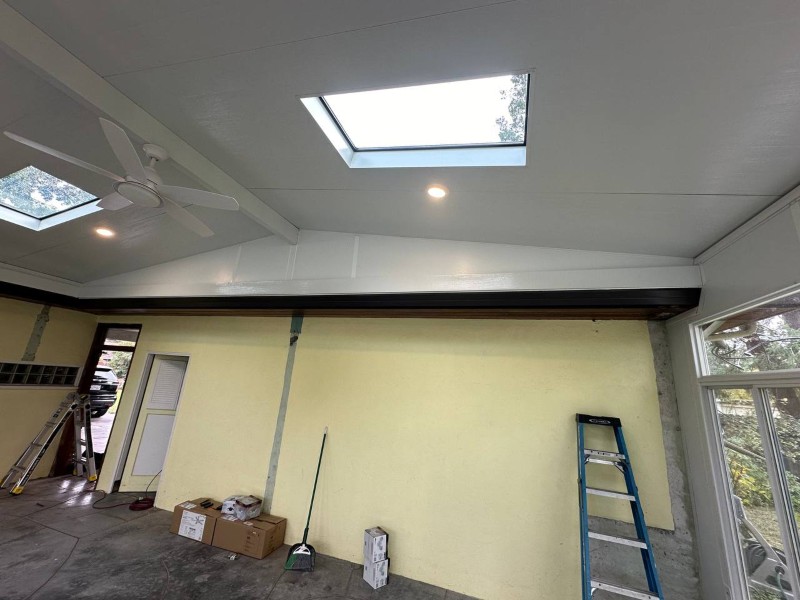A Spacious Room with Skylights and a Ladder, Found in a Patio Setting in Sacramento, CA
